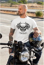 Load image into Gallery viewer, "Stylish streetwear model on a motorcycle showcasing a skull-print t-shirt for bold fashion lovers."
