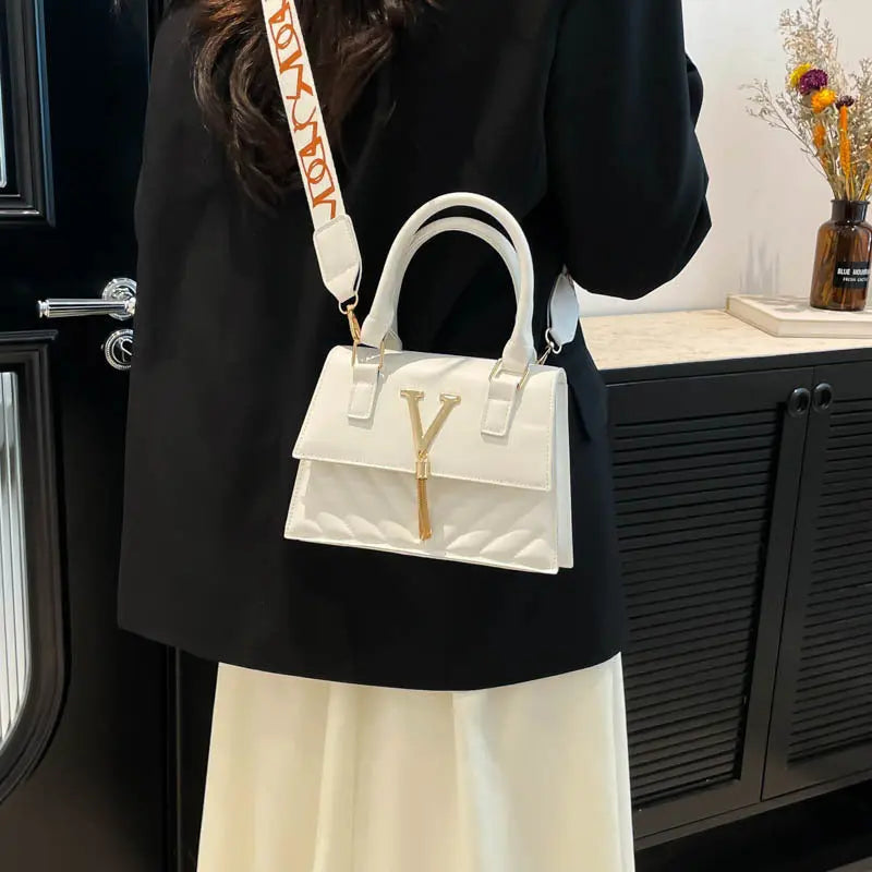 Womens Fashion Solid-Color Tassel Crossbody Bag Raven’s Echo Hoodie