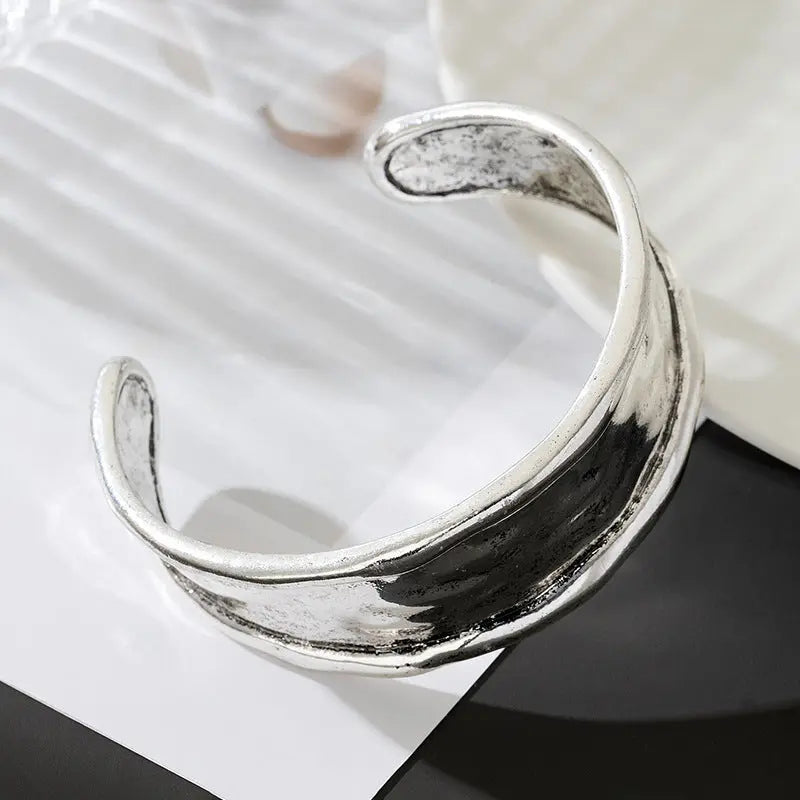Heavy-duty Textured Curved Distressed Bracelet Raven’s Echo Hoodie