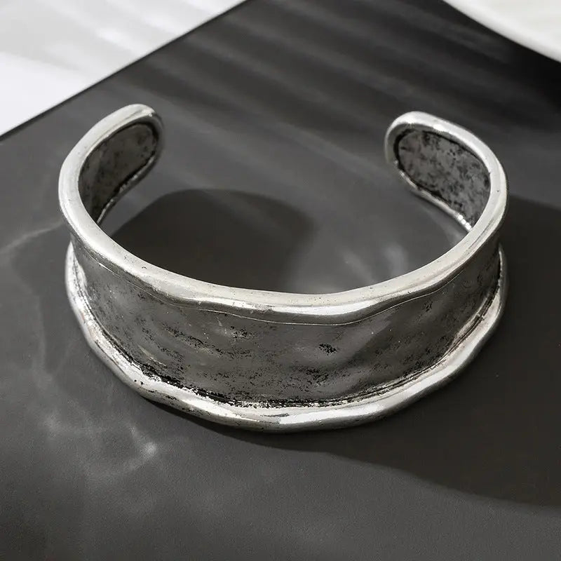 Heavy-duty Textured Curved Distressed Bracelet Raven’s Echo Hoodie
