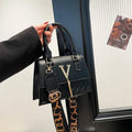 Womens Fashion Solid-Color Tassel Crossbody Bag Raven’s Echo Hoodie