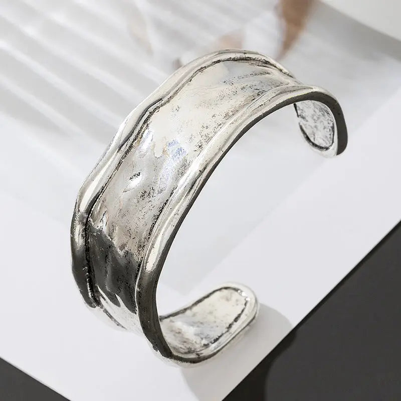 Heavy-duty Textured Curved Distressed Bracelet Raven’s Echo Hoodie