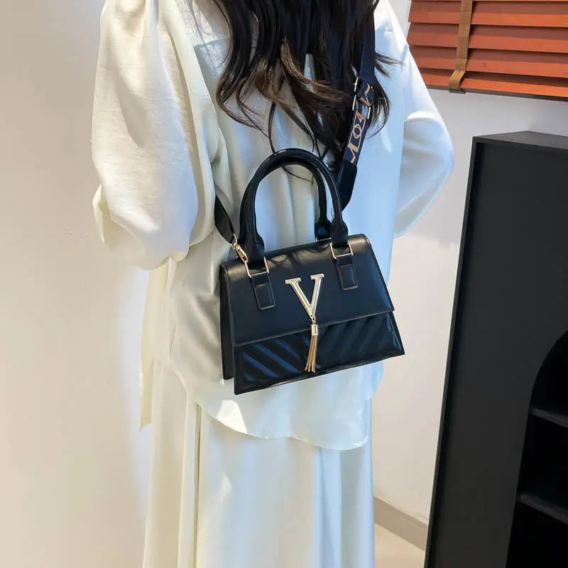 Womens Fashion Solid-Color Tassel Crossbody Bag Raven’s Echo Hoodie
