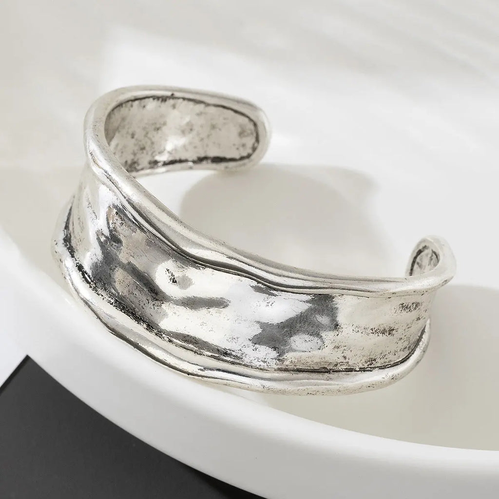 Heavy-duty Textured Curved Distressed Bracelet Raven’s Echo Hoodie