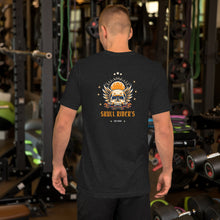 Load image into Gallery viewer, Display of edgy skull-themed t-shirts on racks at Skull Rider store

